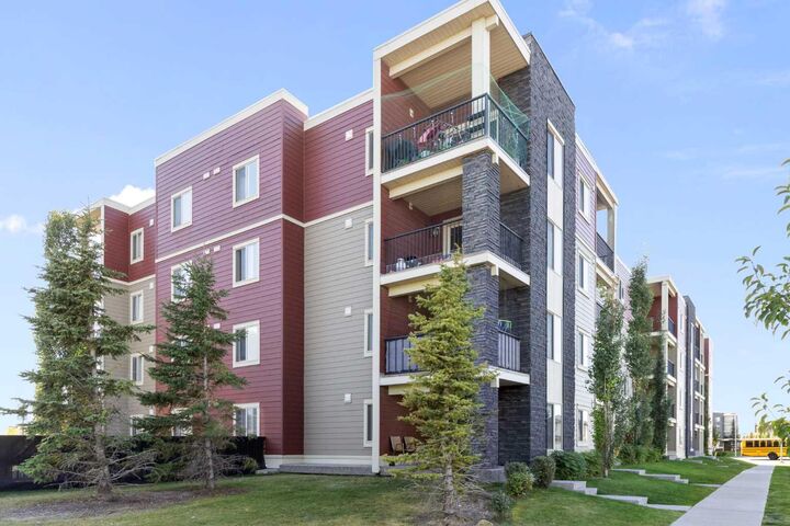 Property Photo: 5 Saddlestone Way NE 312 AB T3J 0S2