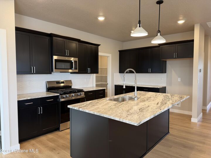 Property Photo:  6981 N Coeur Terre Blvd  ID 83815 