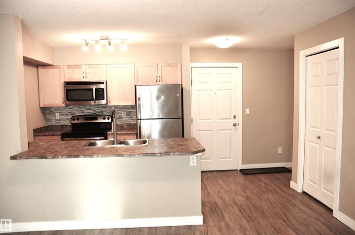 Property Photo: 920 156 Street NW 103 AB T6R 0N6