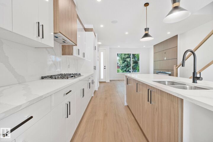 Property Photo: 11140 126 Street NW AB T5M 0P9