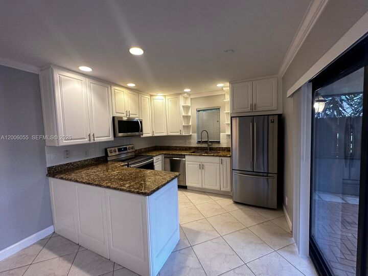 Property Photo:  7671 W Courtyard Run W  FL 33433 