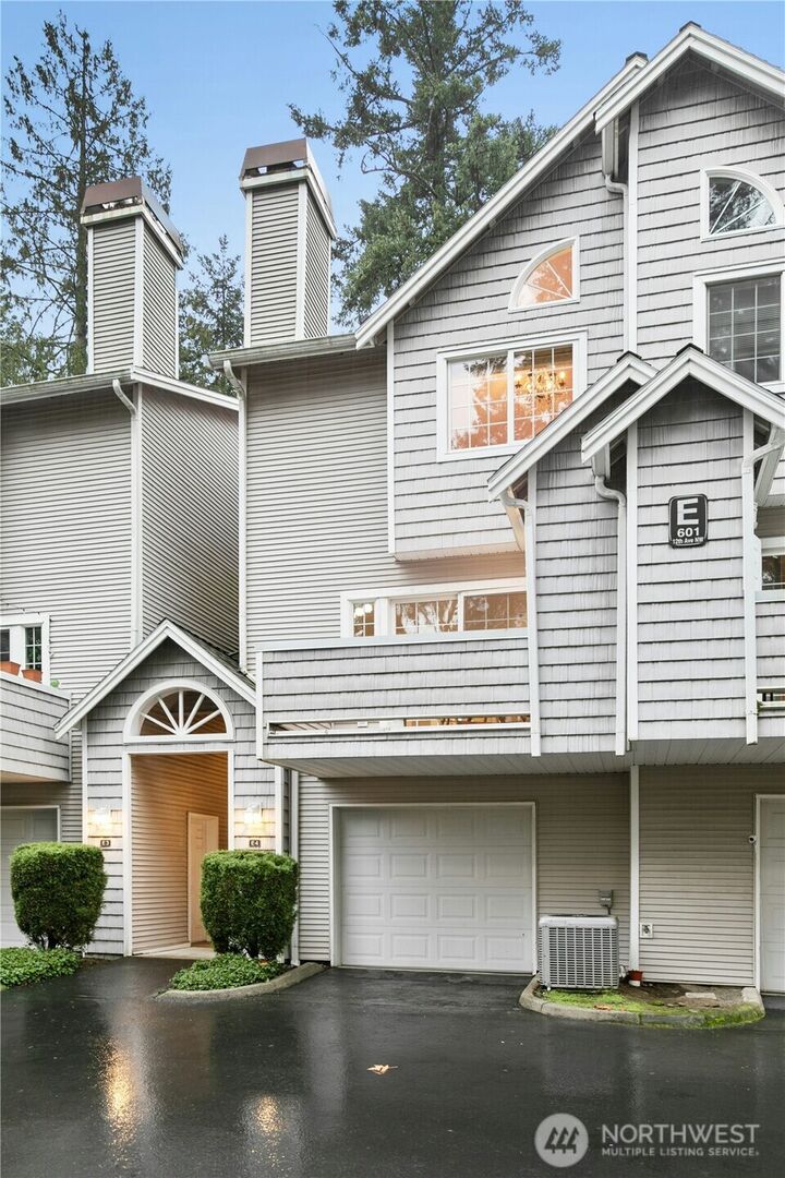 Property Photo:  601  12th Avenue NW E4  WA 98027 