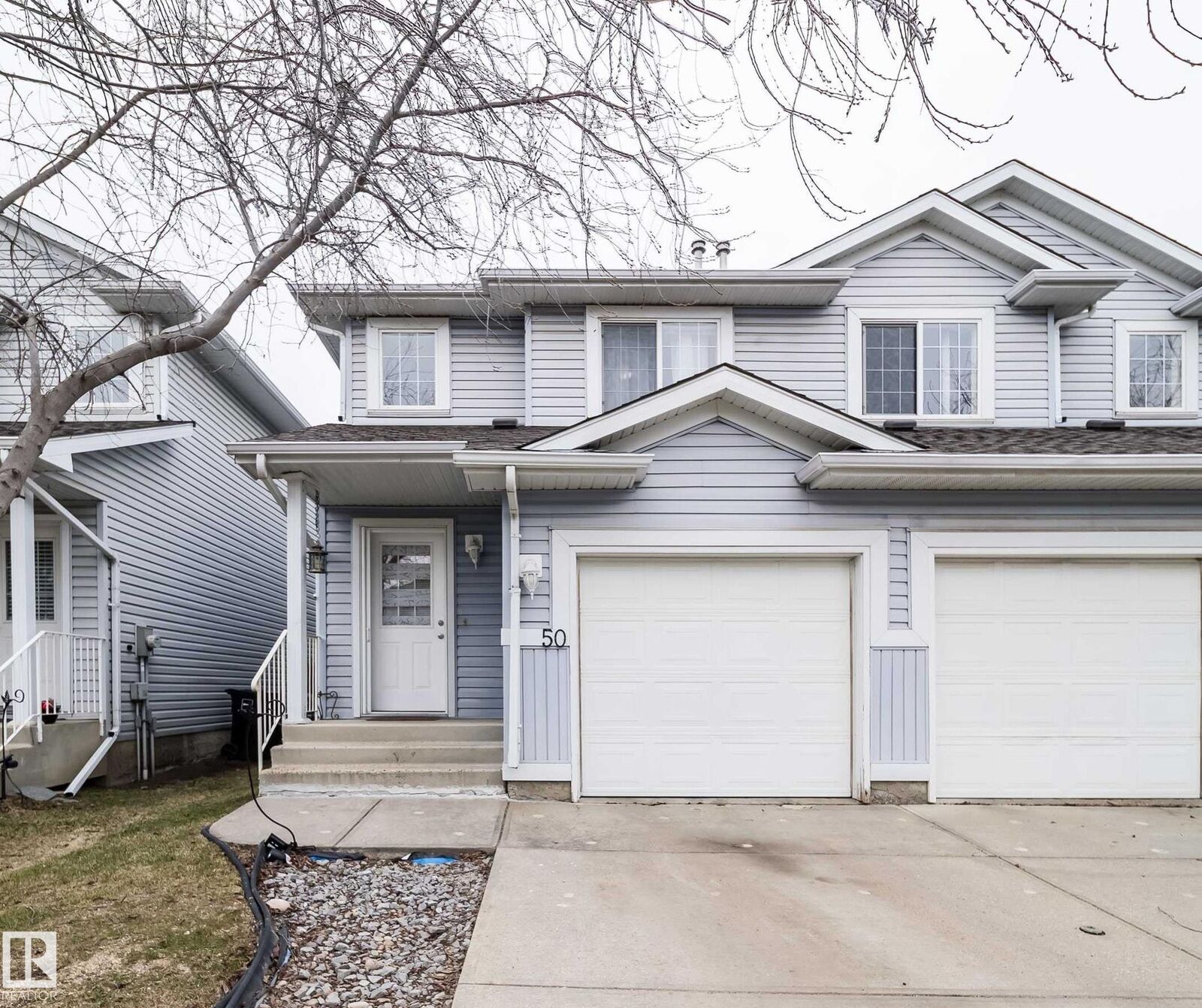 Property Photo: 14603 Miller Boulevard NW 50 AB T5Y 3B6