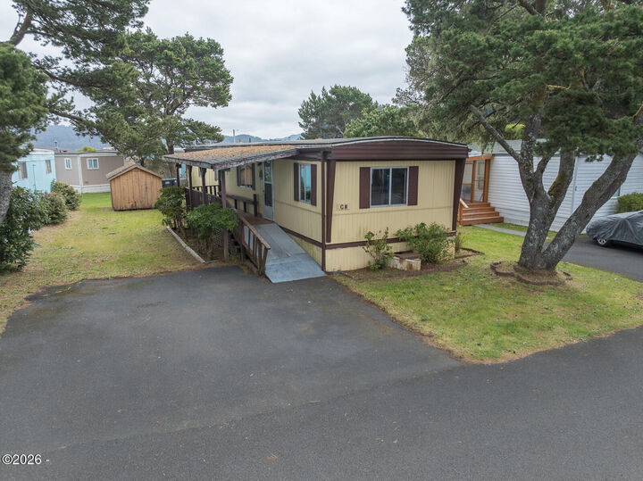 Property Photo:  955 NE Mill Street C8  OR 97394 