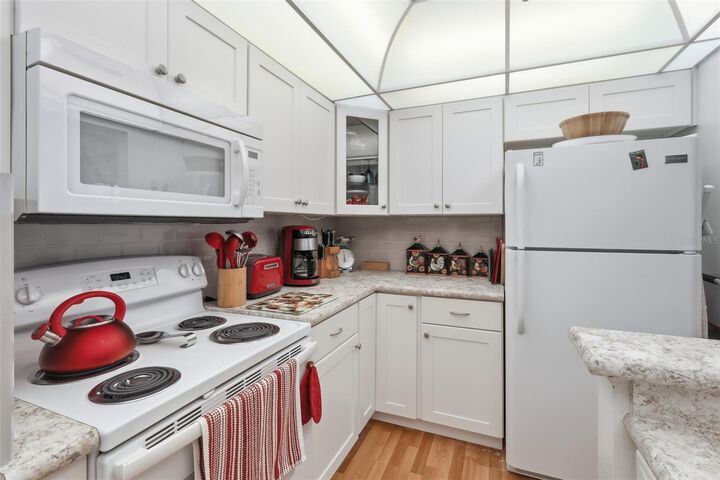 Property Photo:  120 Hibiscus Woods Court 9B  FL 32725 