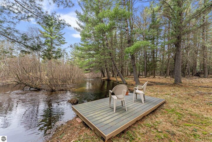 Property Photo:  9890 SE Angel Road  MI 49633 