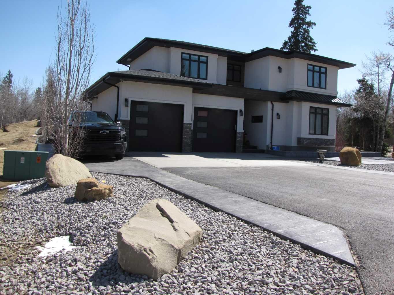 Property Photo:  123 Wolf Run Drive  AB T4J 1R3 