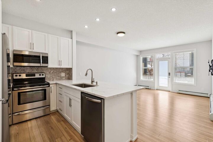 Property Photo:  10 Panatella Road NW 112  AB T3K 0V4 