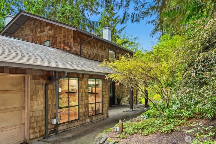 Property Photo:  8151 NE Hidden Cove Road  WA 98110 