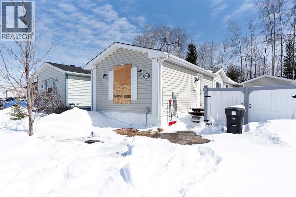 Property Photo: 216 Harpe Way AB T9K 2K8