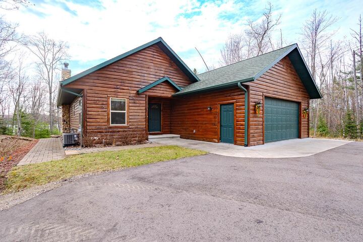 Property Photo:  4387 Double Oaks Tr  WI 54501 