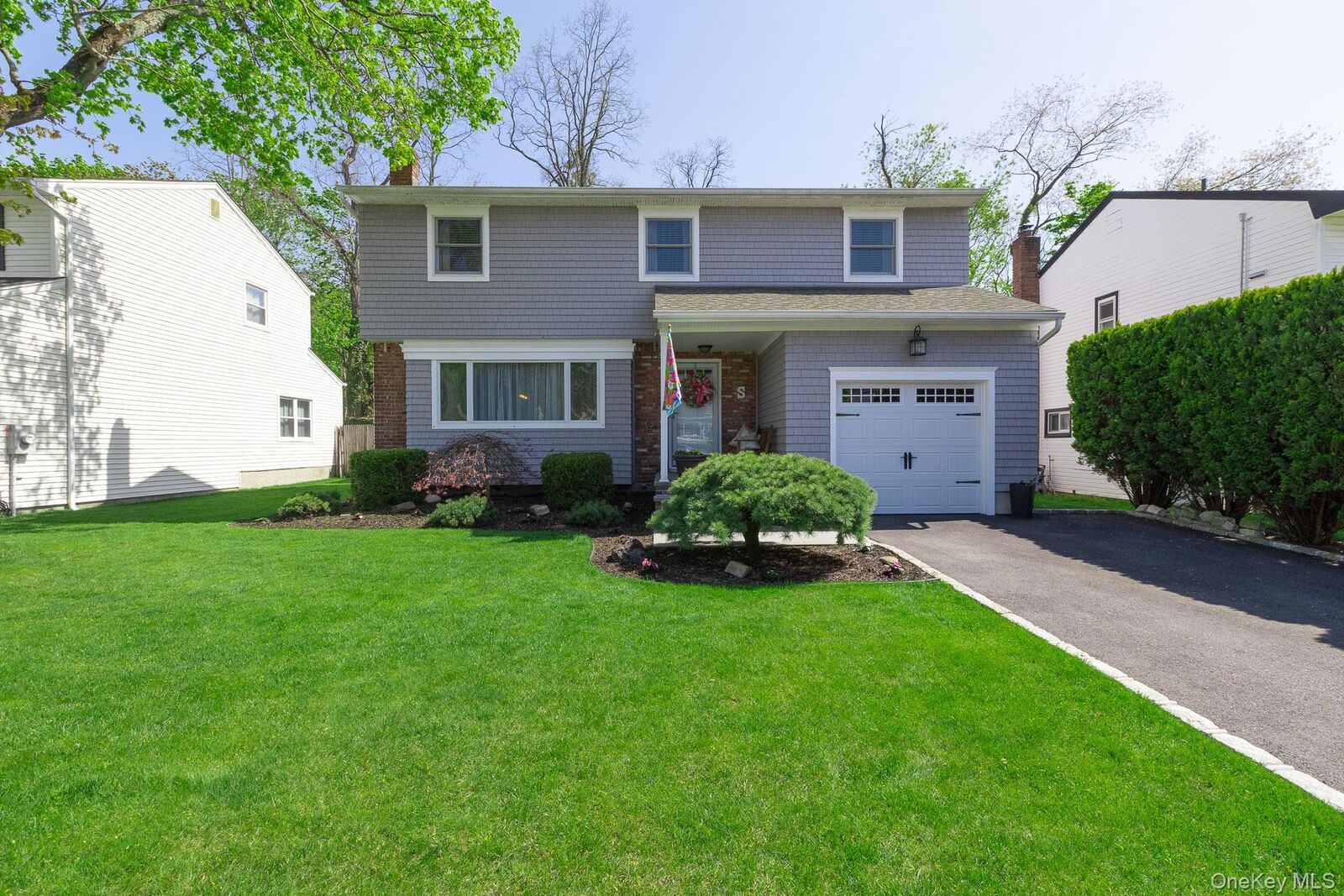 Property Photo:  5 Regina Court  NY 11746 