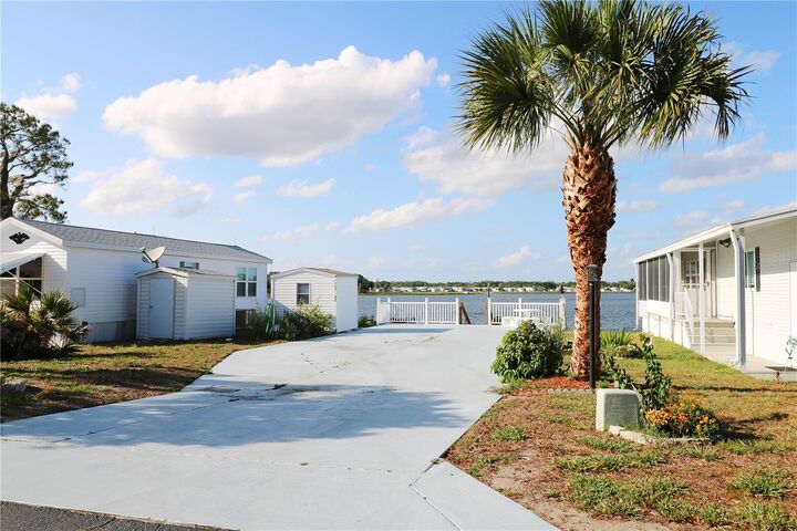 Property Photo:  7205 Windsong Drive  FL 33898 