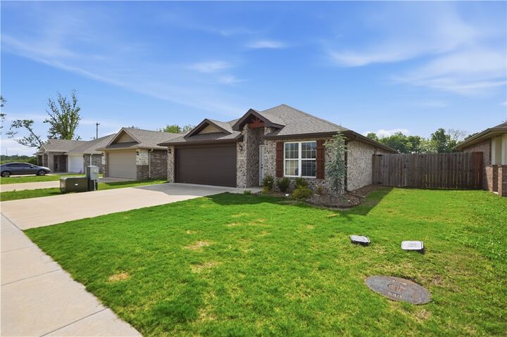 Property Photo:  5905 NW McClellen Street  AR 72713 