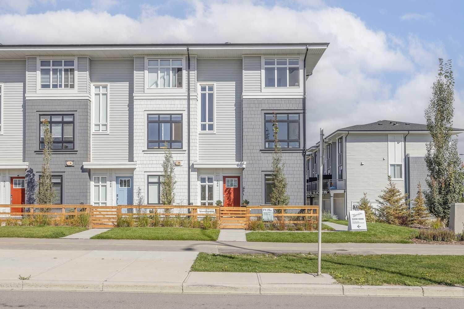 Property Photo: 857 Belmont Drive SW 213 AB T2X 4P2