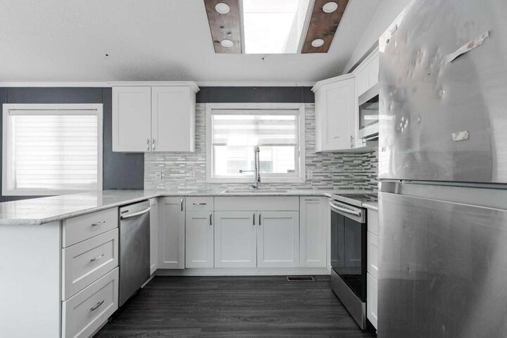 Property Photo:  216 Harpe Way  AB T9K 2K8 