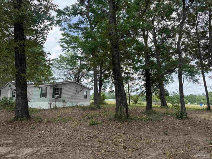 Property Photo:  3308 Deloach Ln  FL 32570 