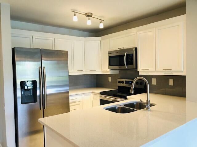 Property Photo:  4767 Via Palm Lakes 206  FL 33417 