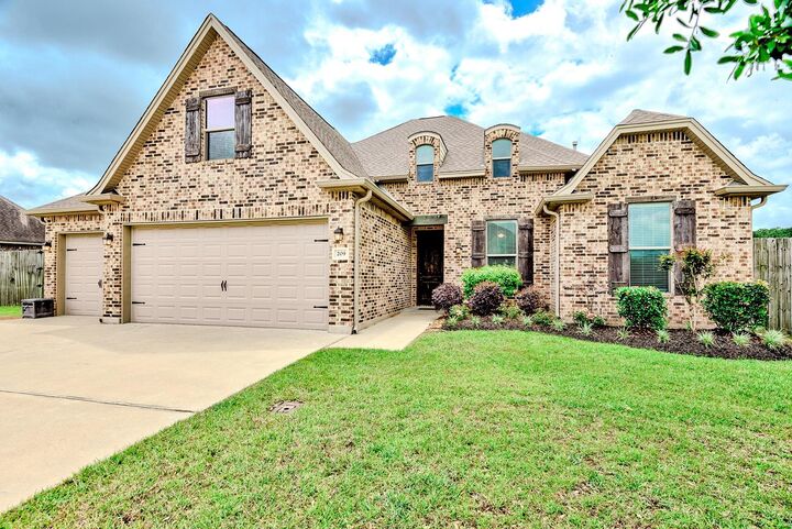 Property Photo:  209 Mandavilla Way  TX 77657 