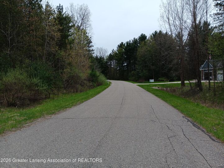 Property Photo:  35 Bennington Greens Drive  MI 48867 