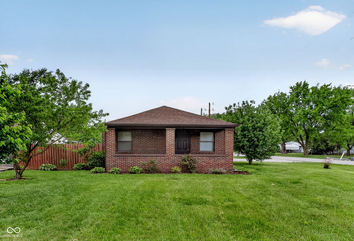 Property Photo:  1402 S Hawthorne Lane  IN 46203 