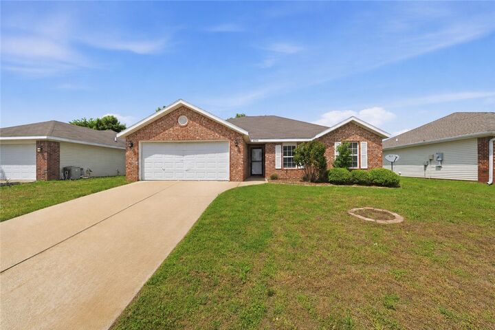 Property Photo:  6208 Meadow Well Avenue  AR 72713 
