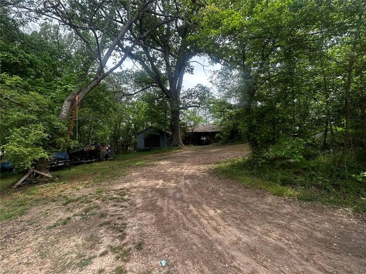 Property Photo:  4854 Stonewall Tell Road SW  GA 30349 