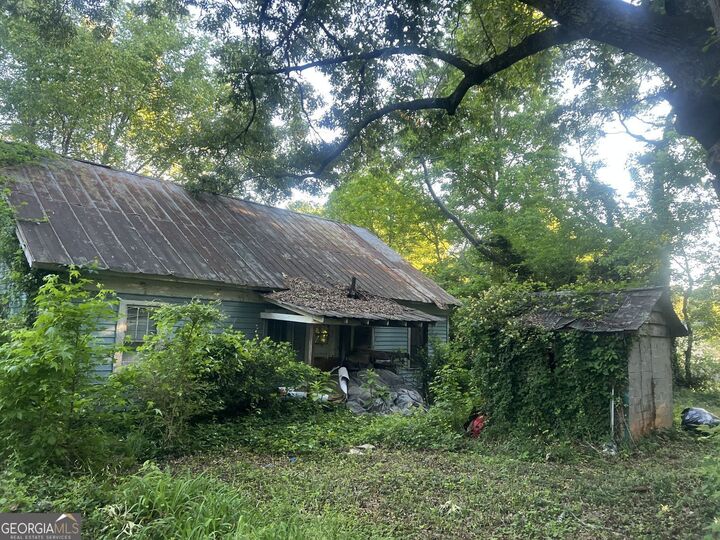 Property Photo:  5884 Rockbridge Road  GA 30087 