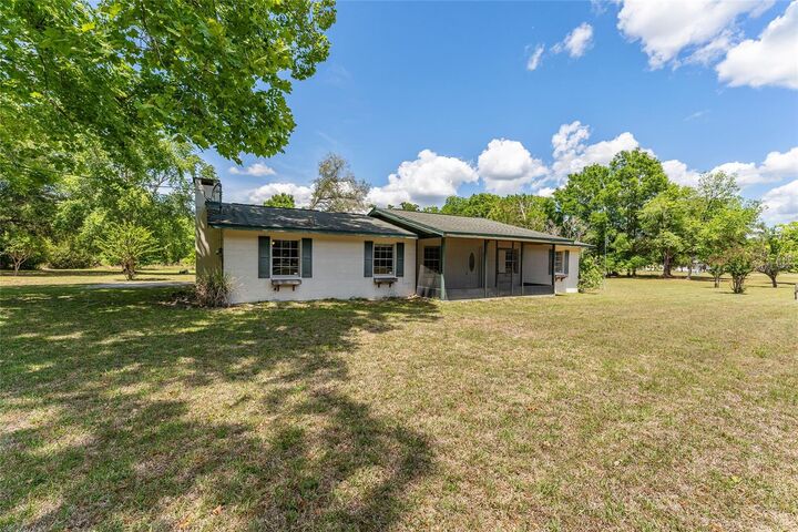 Property Photo:  415 SE Adams Street  FL 32643 