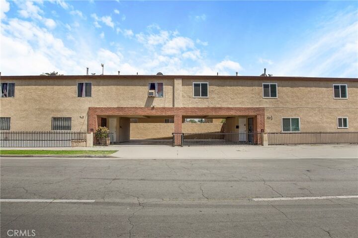 Property Photo:  322 W 105th  CA 90003 