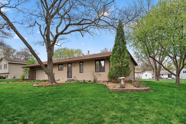 Property Photo:  9904 107th Place N  MN 55369 