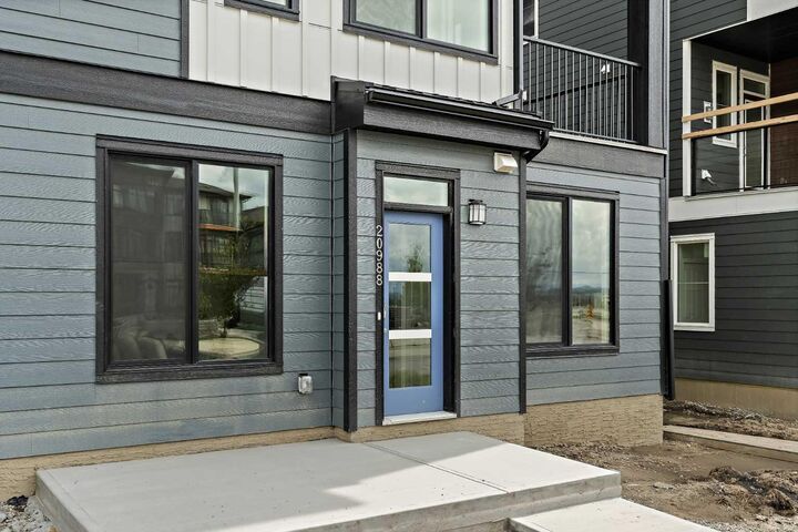 Property Photo: 60 Howse Lane 1104 AB T3P 2Z6
