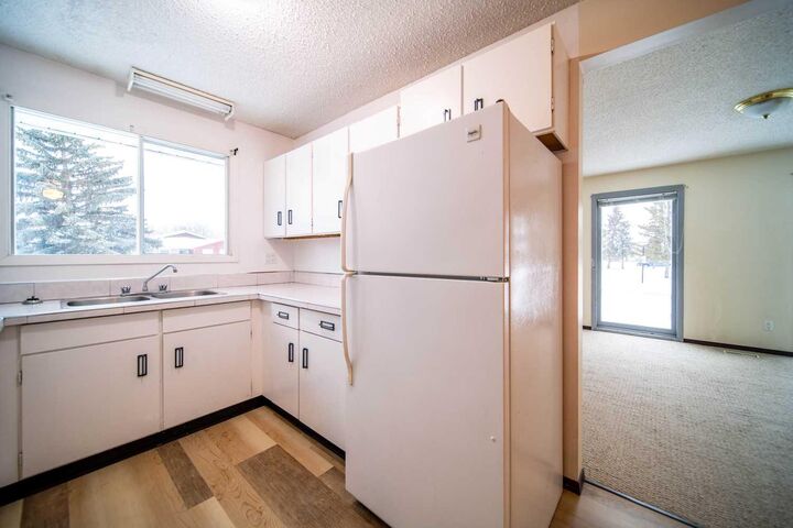 Property Photo:  1601 5 Avenue  AB T9W 1J3 