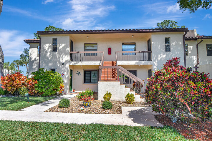 Property Photo:  21864 Arriba Real  FL 33433 
