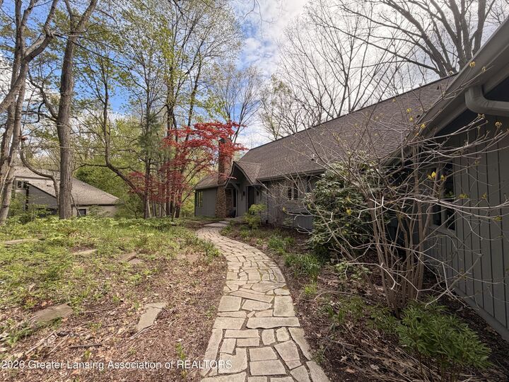 Property Photo:  4772 Arapaho Trail  MI 48864 