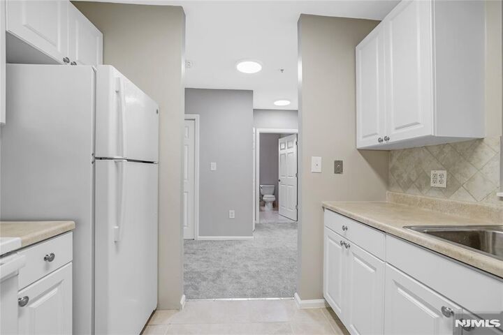 Property Photo:  905 River Road 329  NJ 07020 