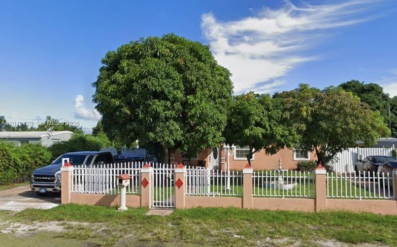 Property Photo: 1725 NW 121st St FL 33167