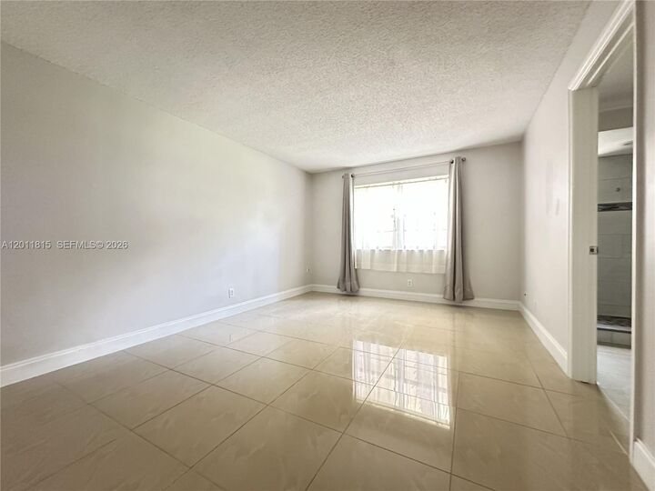 Property Photo:  9370 SW 8th St 107  FL 33428 