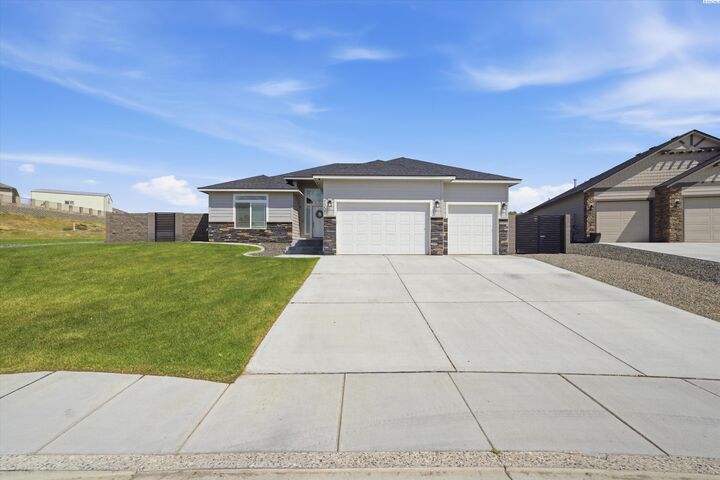 Property Photo:  7207 Cornflower Dr  WA 99301 
