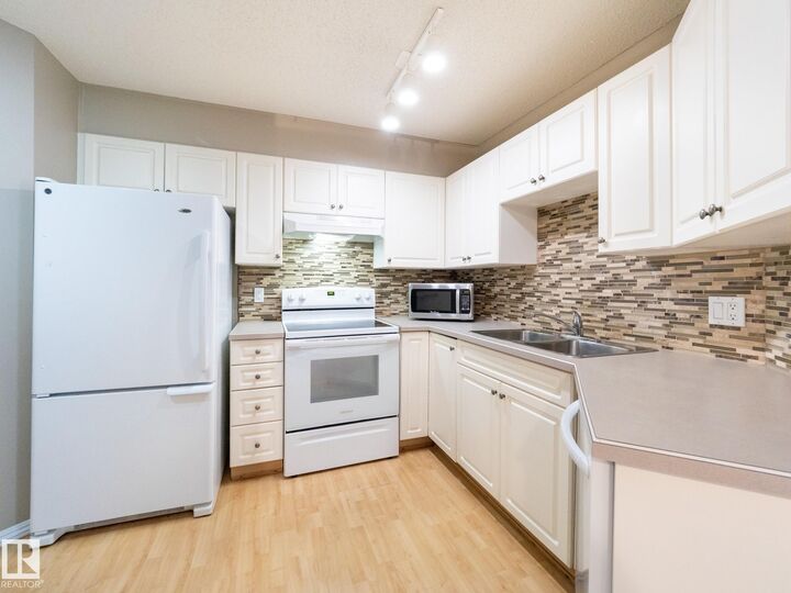 Property Photo:  11716 100 Avenue NW 205  AB T5K 2G3 
