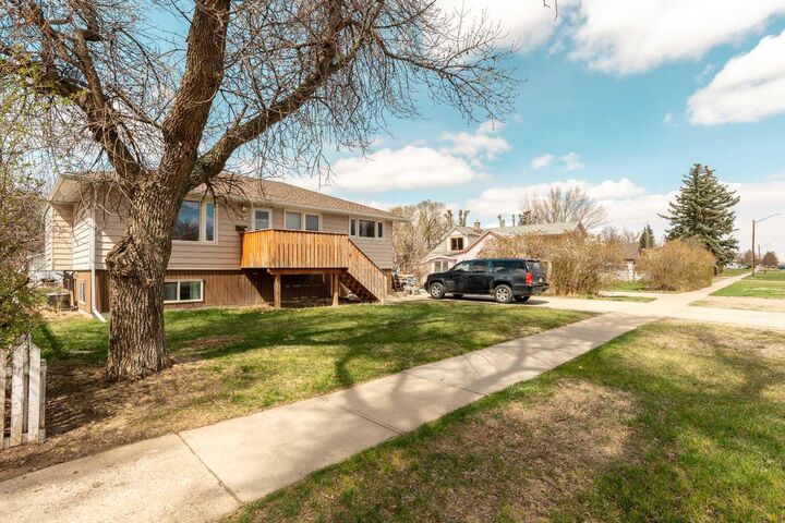 Property Photo:  5816 52 Street  AB T1G 1K7 