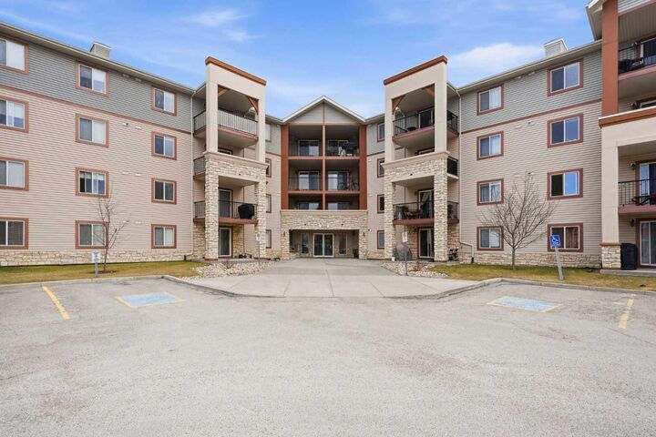 Property Photo:  505 Railway Street 2324  AB T4C 2K9 