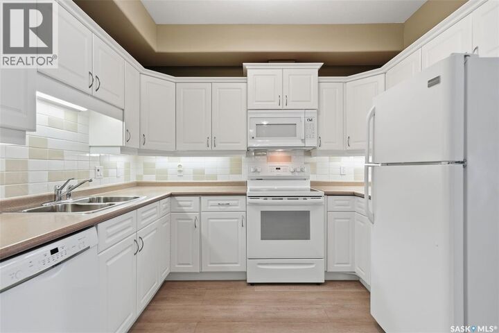 Property Photo:  113 110 Armistice Way  SK S7J 5L8 