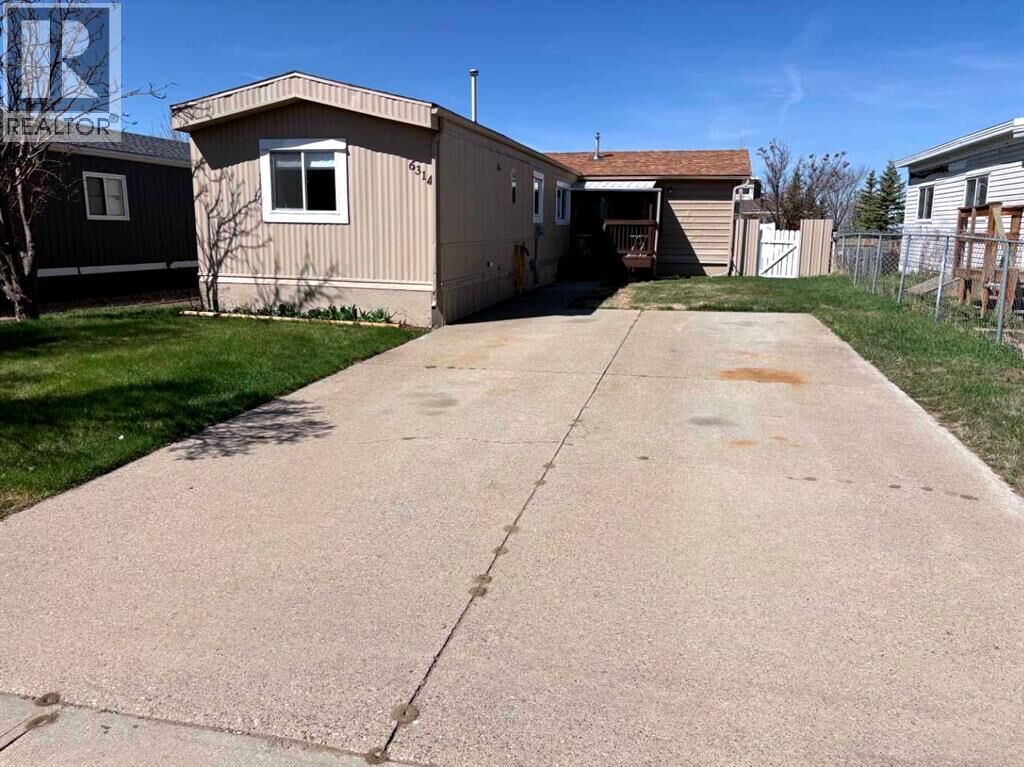 Property Photo:  6314 48 Street  AB T1G 1J3 