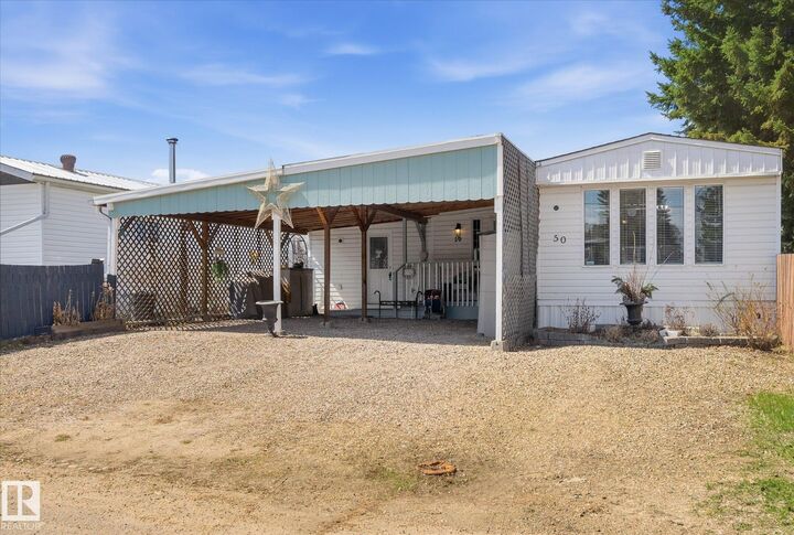 Property Photo:  50 305 Calahoo Road  AB T7X 3K6 
