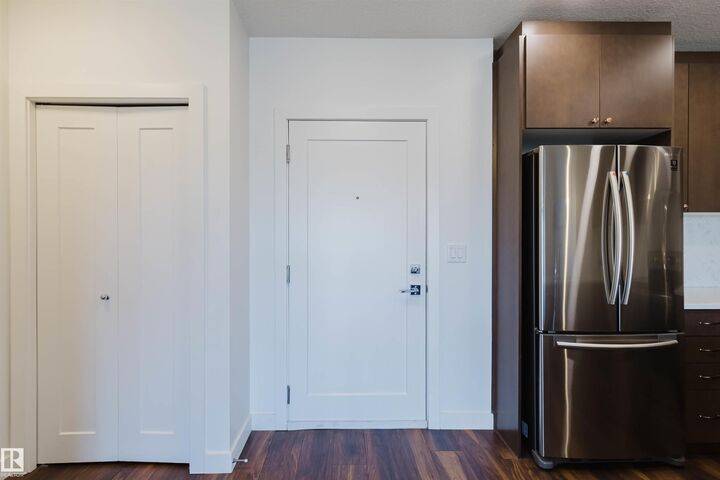 Property Photo:  1316 Windermere Way SW 205  AB T6W 2J3 