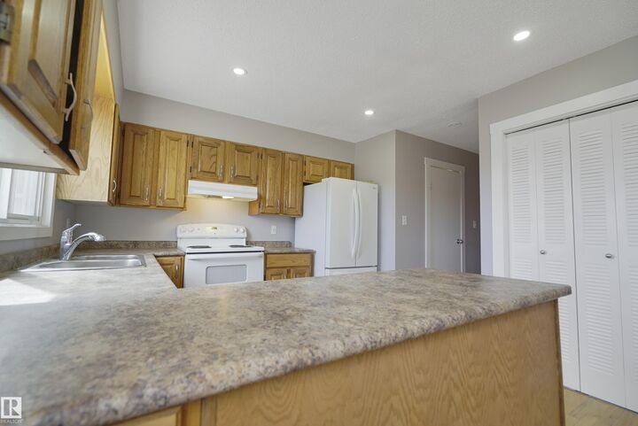 Property Photo:  10612 158 Avenue NW  AB T5X 4H5 