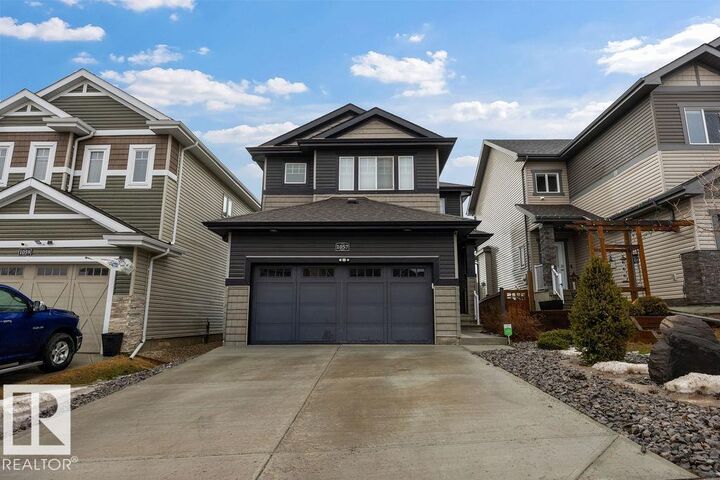 Property Photo:  1057 Coopers Hawk Link NW  AB T5S 0M2 