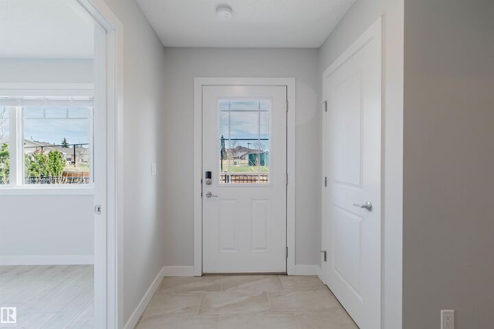 Property Photo:  11373 12 Avenue NW 3  AB T6J 5V2 