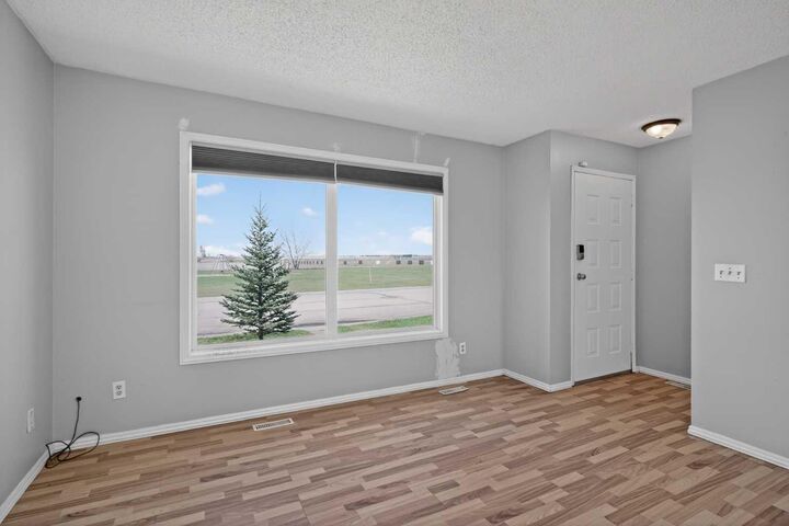 Property Photo:  110 McKinnon Drive  AB T0J 0M0 
